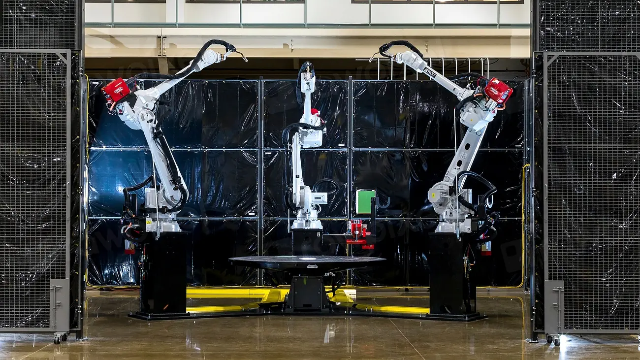 Industrial welding robots on a manufacturing line